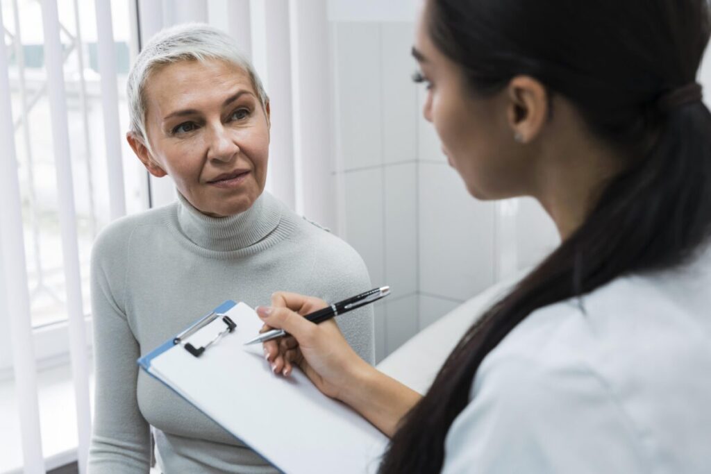 Doctor talking to patient